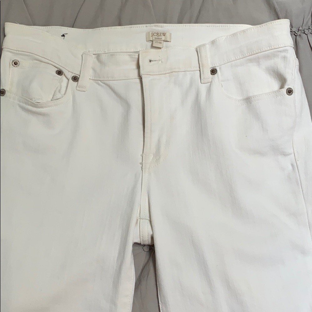 J crew 27/30 white jean pants. Minor stain